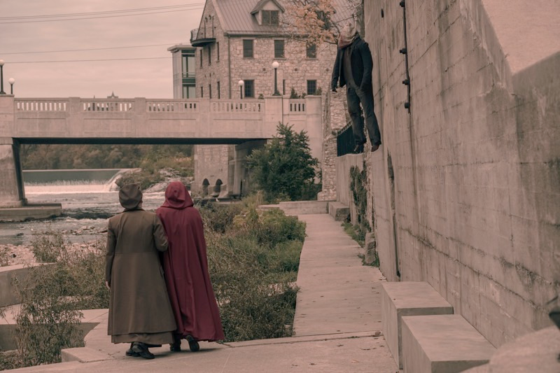 The bridge, the river, and the wall (used to display the corpses of Gilead traitors) have all become familiar sights.